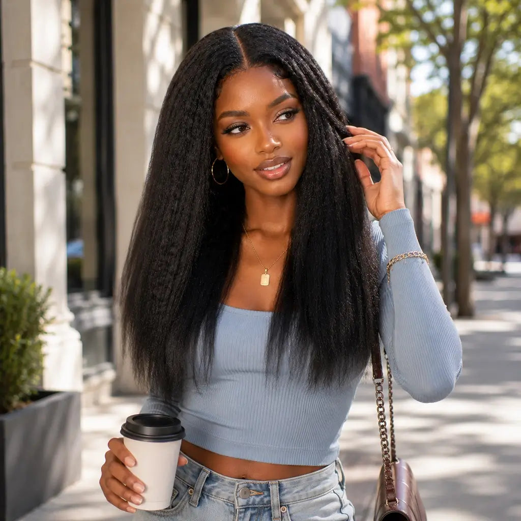 Black kinky straight HD lace closure wig on a mixed-race Black woman with realistic volume
