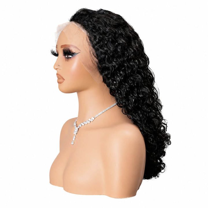 Mannequin head with a black curly wig on a white background